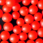 Solid Red Polyethylene microspheres 250-300um